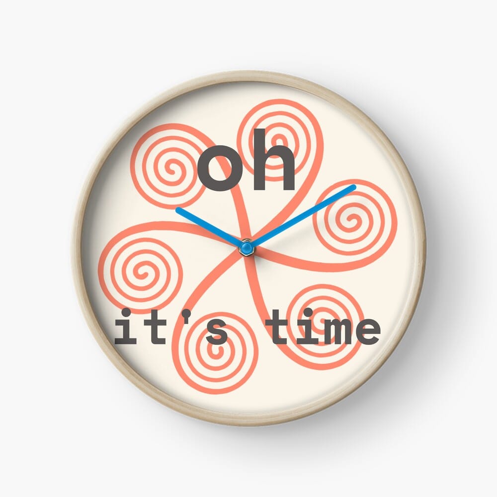 Clock with bamboo frame and bright blue hands, the coral spiral on a bone background face and the words OH It's Time